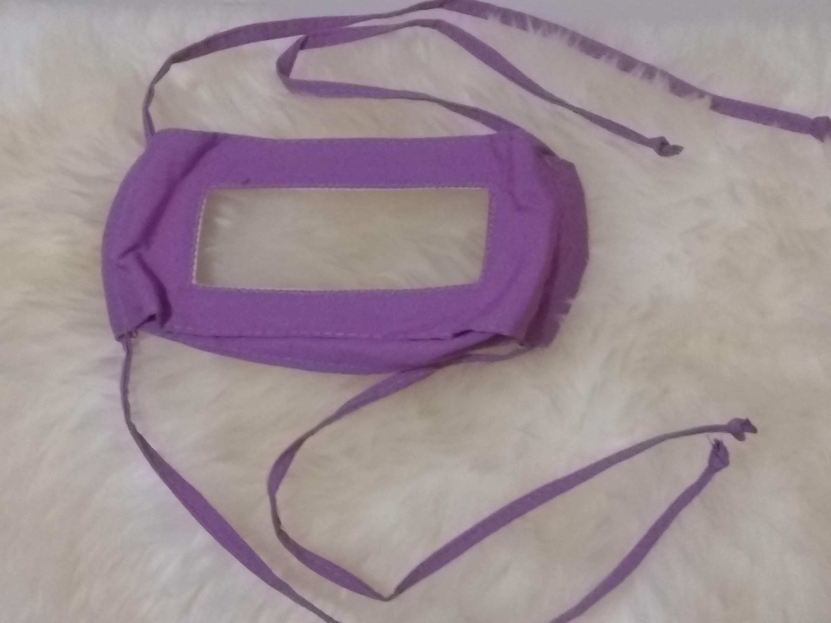 Image of the windowed face mask in purple.